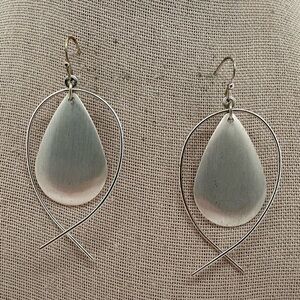 Silvertone geometric movement dangle earrings